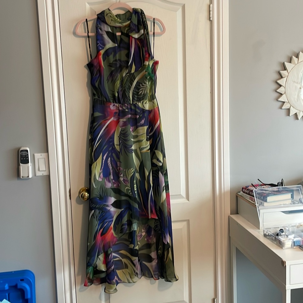 NWOT. Frank Lyman dress high low design with neck tie detailing. Fully lined.